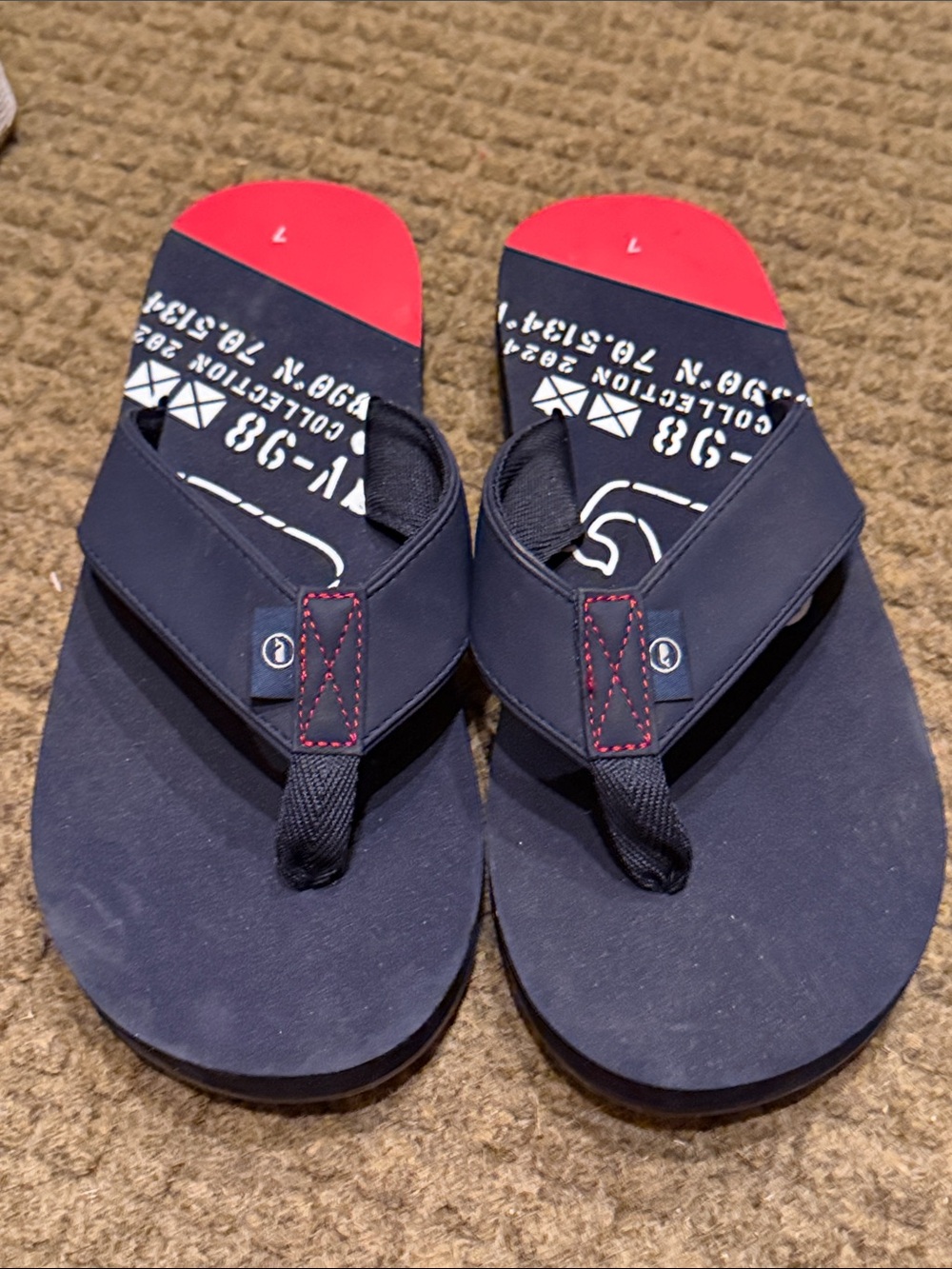 VV Navy Flip Flop Sandals with Red Accent